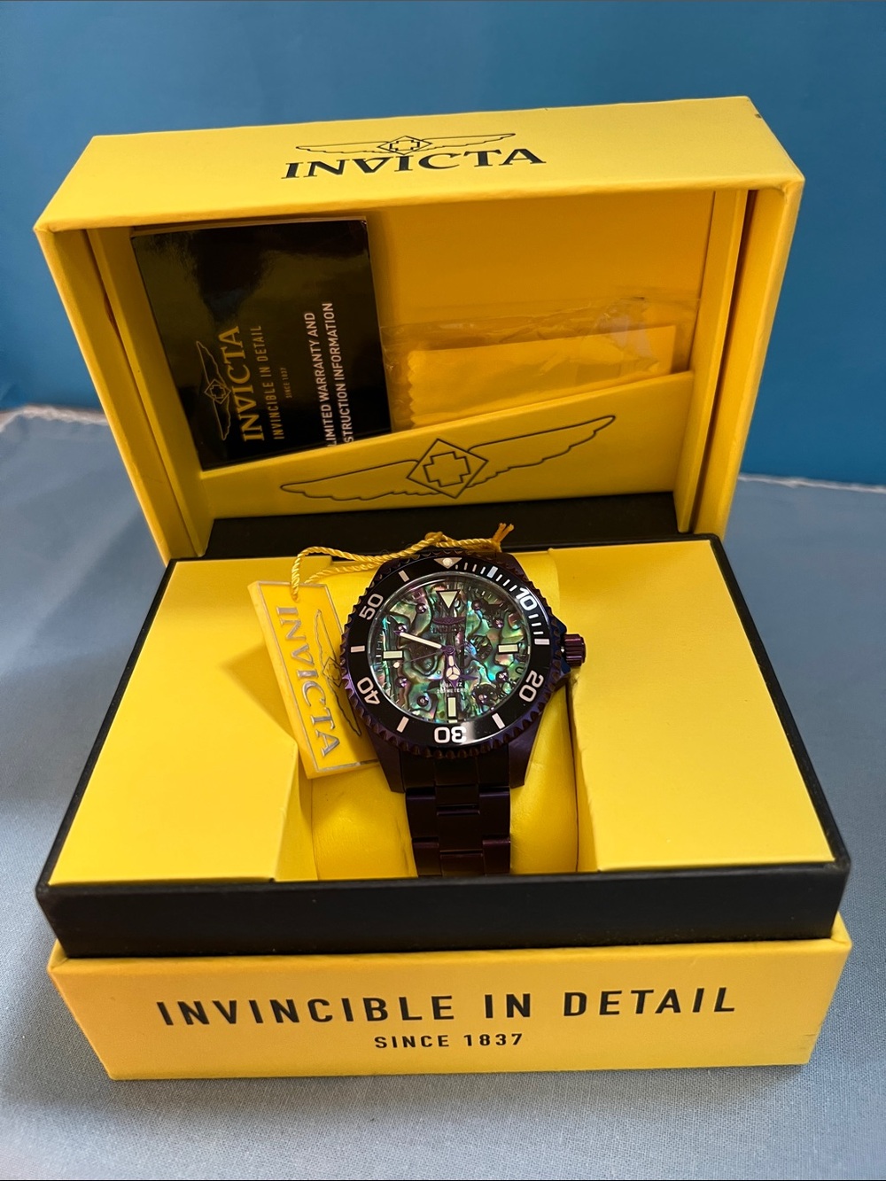 Invicta Men's Watch with Iridescent Green Abalone Face & Dark Purple Steel Band